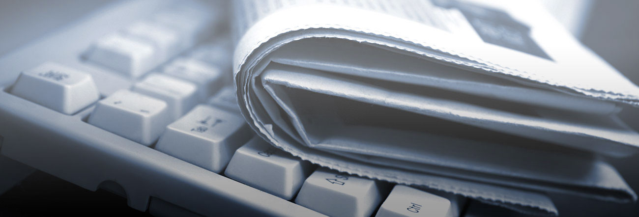 newspaper on a keyboard